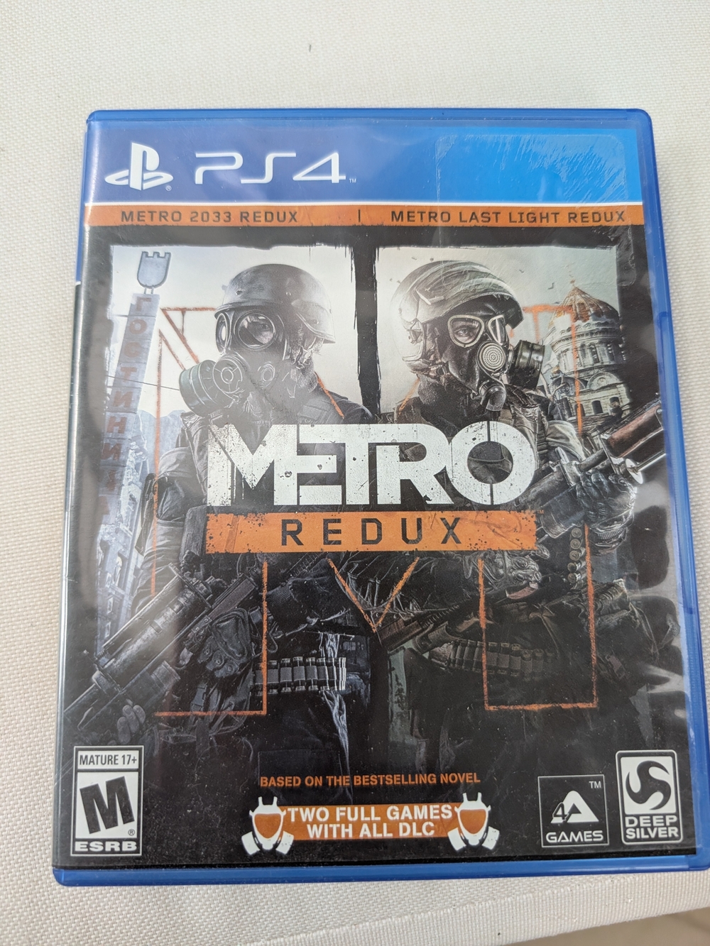 Sony PS4 Metro Redux — Black & Orange Cover Art